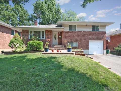 Spacious Split Level Home With Newly Refurnished Hardwood Floors On Main Level And Tubular Stair Railings. Eik That Opens Into The Lr And Dr. Complete Den With Built-In Custom Oak Entertainment Unit. Basement With Laundry Area.  Mbr With Bath.  Hallway Bath Newly Renovated. Central Ac, Alarm System, One-Car Attatched Garage.