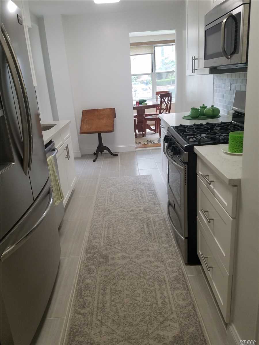 950 Sq.Ft. One Bedroom/ Renovated Throughout. Steel Appliances, Central Air/Heat, Reserved Parking Included, No Flip Tax/100% Equity......Washer/Dryer Permitted In Unit.....Close To All Transportation, Bay Terrace Shopping Center, Local Buses, Express Bus To City Right Outside Your Door/ Short Distance To The Lirr. A Must See!
