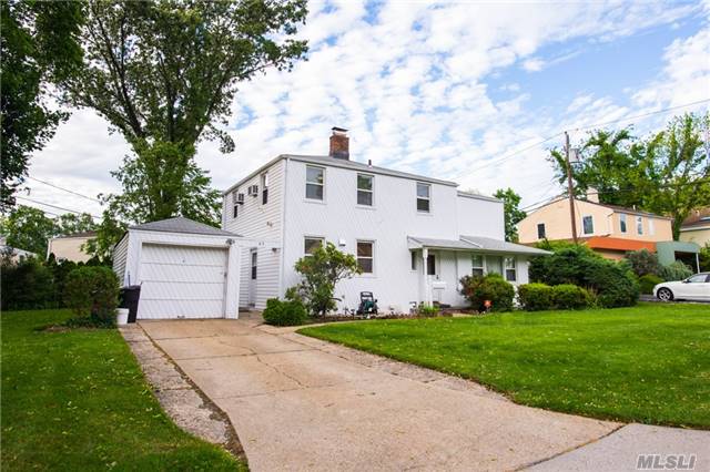 Beautiful Colonial With A Massive Backyard. New Kitchen/Bath/Wood Floors/Finished Basement