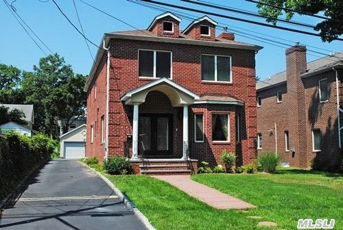 Young Spacious Brick Colonial Near All.Open Floor Plan.Eat-In Kitchen,  4 Large Bedrooms. Fabulous Basement With Newly Tiled Floors.