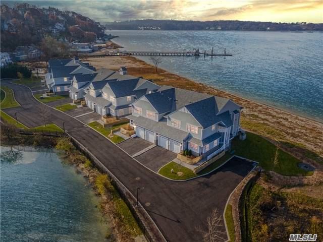 Extraordinary Design And Contemporary Luxury Describes This Waterfront Townhouse W/Spectacular Views Front And Side . Sundrenched Open Flr Plan Blending State Of The Art Kitchen, Dining And Lvg Rm W/ Gas Frplce. French Drs Lead To Deck And Private Beach. Plus Den/ Ofc Master Suite W/Fplce., French Drs And Luxurious Spa Bth W/Radiant Ht. Rich Oak Flrs, Humidifier Sys. Gated Community. Hampton&rsquo;s Alternative, Resort Style Living!