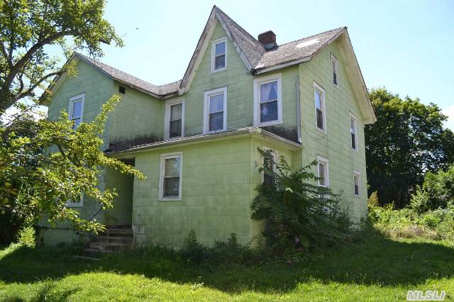 This Hugh House Set On A Large Lot With 5 Bedroom And 3 Bathroom. This House Was Built In 1888 And Is Located In Glen Cove. There Is A Kitchen,  Living Room,  Dining Room,  Bathroom And Bedroom On The First Floor. The Second Floor Has A Bathroom,  Kitchen,  Bedroom,  Bedroom,   Bedroom. The Attic Has 2 Large Rooms.  There Is A Unfinished Basement With A Boiler.