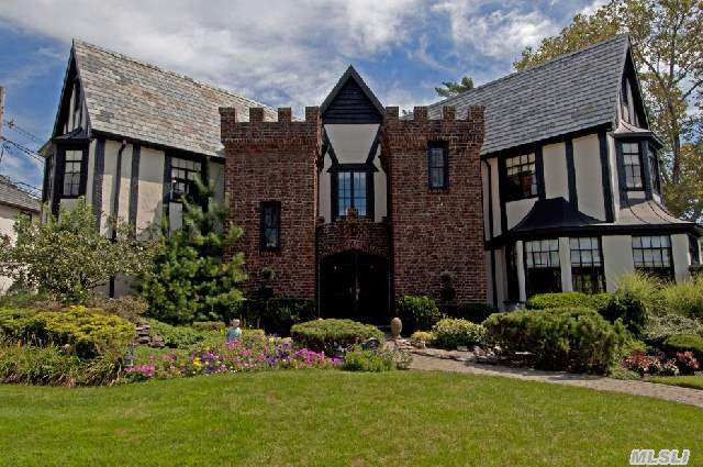 Local Landmark Dual Turret Tudor In Strathmore South. Originally Built & Owned By William Levitt & Now Restored To Perfection On One Of The Larger Properties In The Community.Featured On News 12 Rich Cribs. Words Do This Unique Home No Justice!