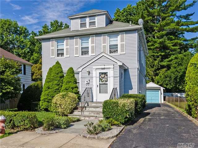 Charming Colonial With Upside Potential. Entrance Foyer Leads To Large Living Room & Formal Dining Room, Eat-In-Kitchen With Separate Laundry Room, Secluded Rear Yard With 1 Car Detached Garage & Deep Driveway. Excellent Value.