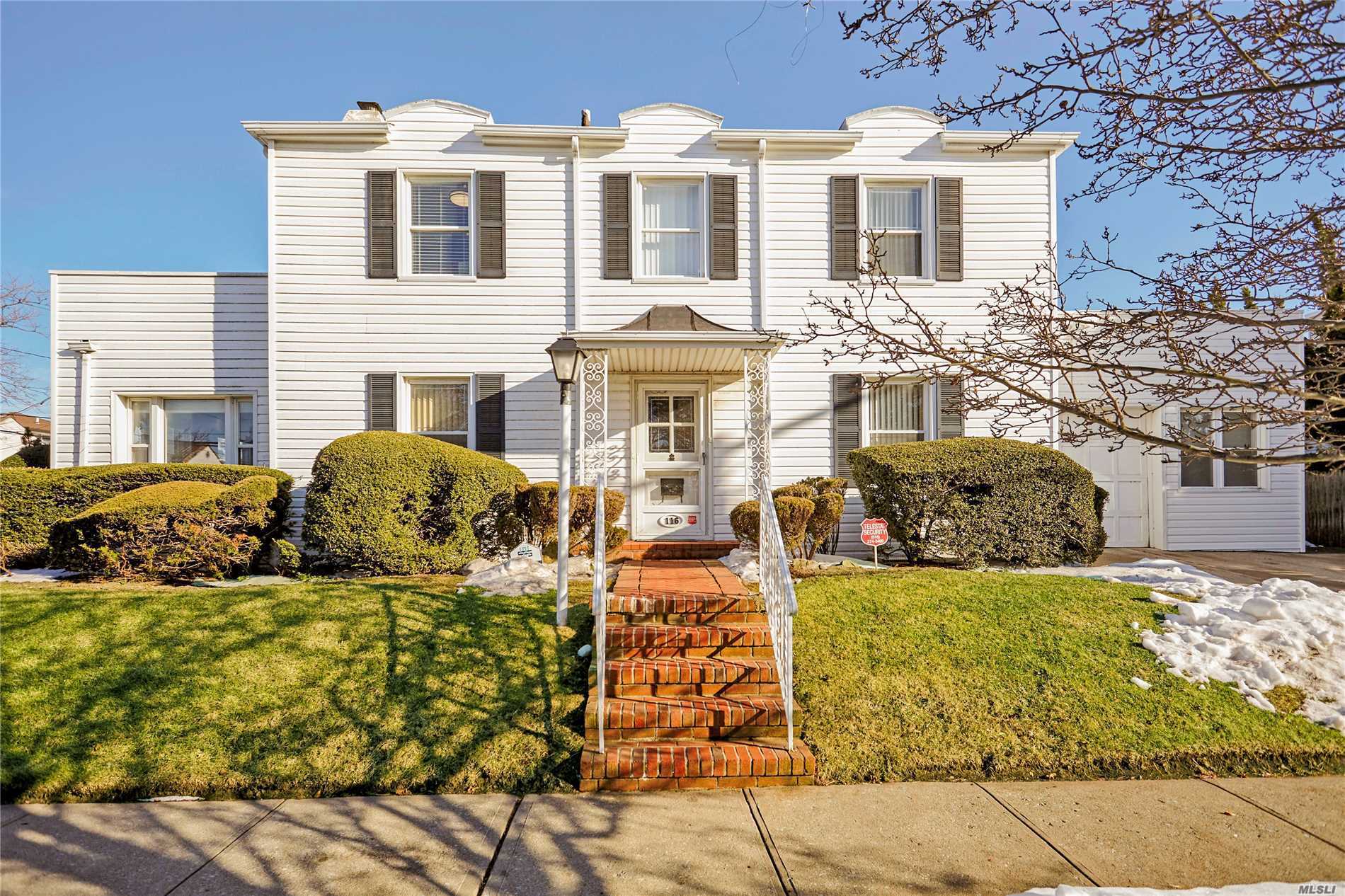 Location , Location, Location !! Exclusive Private Beach Community. Spacious C/H Colonial Located On Corner Of Prestigious Bay Blvd. 1st Fl-Sunlit Lr W Wood Burning Fpl, Sitting Room Sunroom, Formal D/R, Eat-In Kitchen. Office/Bdrm W Full Bath And Closet. 2nd Fl-Master W Bath, Plus 2 Additional Bdrms And 1 Full Bath. Make It Your Own!!