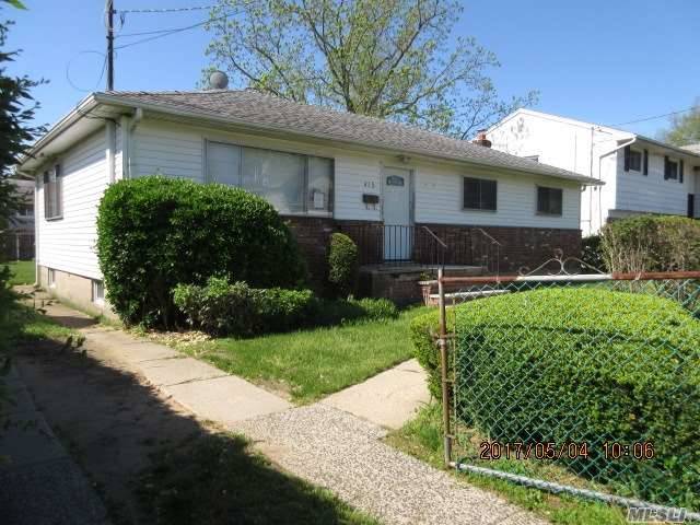 This Ranch Features A Huge L Shape Lr/Dr, Eik, 3 Brms , Full Bathroom And A Full Unfinished Basement With High Ceilings. Larger Than It Looks. Large Back Yard.