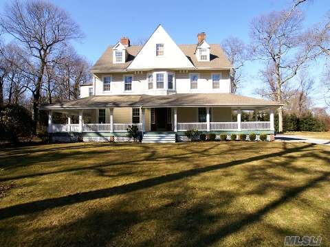 Amazing Opportunity To Own In Laurel Hollow! Updated Victorian Featuring Wrap-Around Porch, High Ceilngs, 6 Fireplaces, Stunning Foyer Grand Staircase, Beautiful Moldings And Woodwork. Many Updates Including Windows, Bathrooms,Flat 2 Acres. With Huge Barn Could Fit 4 Cars. Laurel Hollow Beach Association