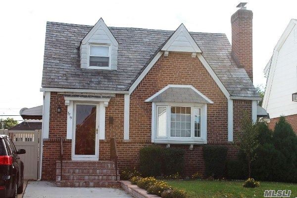 Nestled Mid-Block On Quiet Street, Large Spacious Brick 4 Br/2 Bth Cape With Slate Roof In Desirable Bayside Hills, Fully Renovated Kitchen & Baths, Gorgeous Hardwood Floors Throughout, Lr W Fireplace, Full Finished Basement, Semi-Inground Pool W Deck & New Liner, Enclosed Porch, New Fence. New Oil To Gas Conversion, Sd 26, , Ps 203. Close To All.