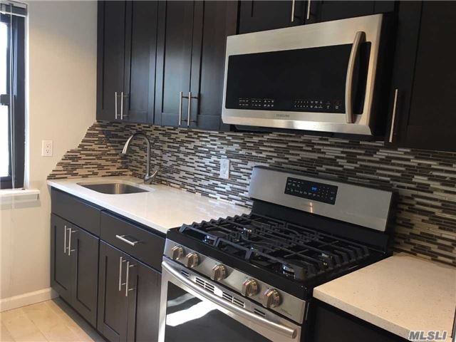 Diamond Condition 1Br. New Kitchen W/Ss Appliances, New Bath, New Hardwood Floors, Crown Molding Throughout, New Electric And Lighting Fixtures And More! Security Petrol, Pet Friendly, Olympic Size Pool, Indoor Garage Included, Lirr 2 Mins.