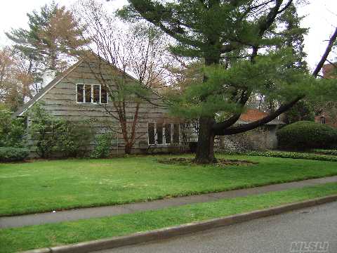 Great Location!  Superb Country Club Setting On Over-Sized Property.  Spacious Living Room With Fireplace And Dining Room.  Eat-In-Kitchen, Library, And Five Bedrooms.  Three Full Baths, 2 Car Garage.  With Tender Loving Care, This Will Make A True Country Club Showplace!  