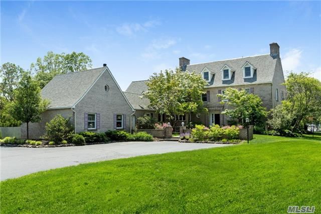 Elegantly Appointed, Updated Colonial On Manatuck Creek Seconds From The Great South Bay, Antique Brick Walled Garden, Shed And Screen House Original To The Estate On Perfectly Manicured Grounds. Views From Every Room! Completely Updated-Just Unpack