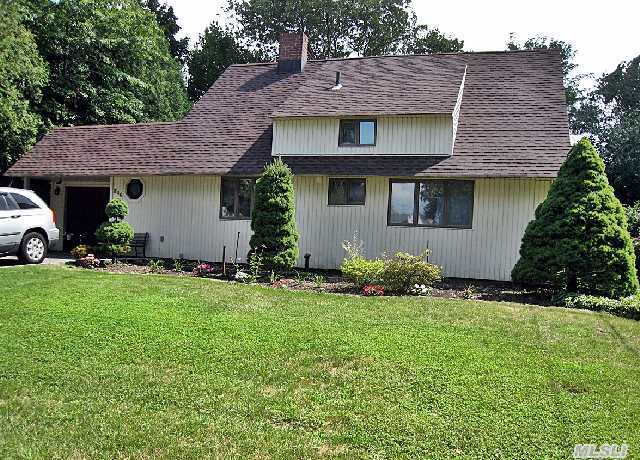 Expanded Levitt Ranch. Extension Across Entire Rear Of Home. Open Plan & Laminate Flooring. 2 Br.Upstairs; Master W/ Loads Of Closets. (Bath Up Does Have Shower .) Roof 5 Yrs Old; Windows Redone; Stove,  Refrig Less Than 5 Yrs Old. Boiler Rm & Laundry Moved! + Extra Unheated Rm On 1st Flr.