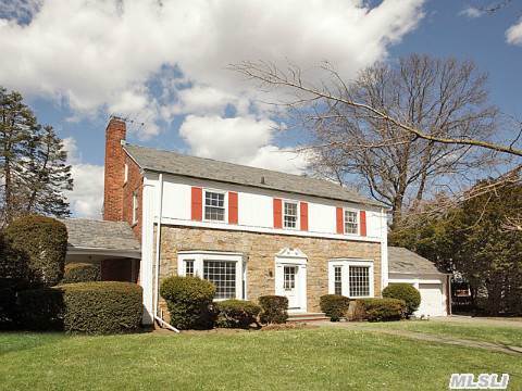 Stately Center Hall Colonial With 5 Brs, 3 Full Baths, Oversize Lr W/Fpl, Fdr With Corner Built-Ins. Gleaming Hw Flrs Throughout. Freshly Painted. Cac Large Flat Property