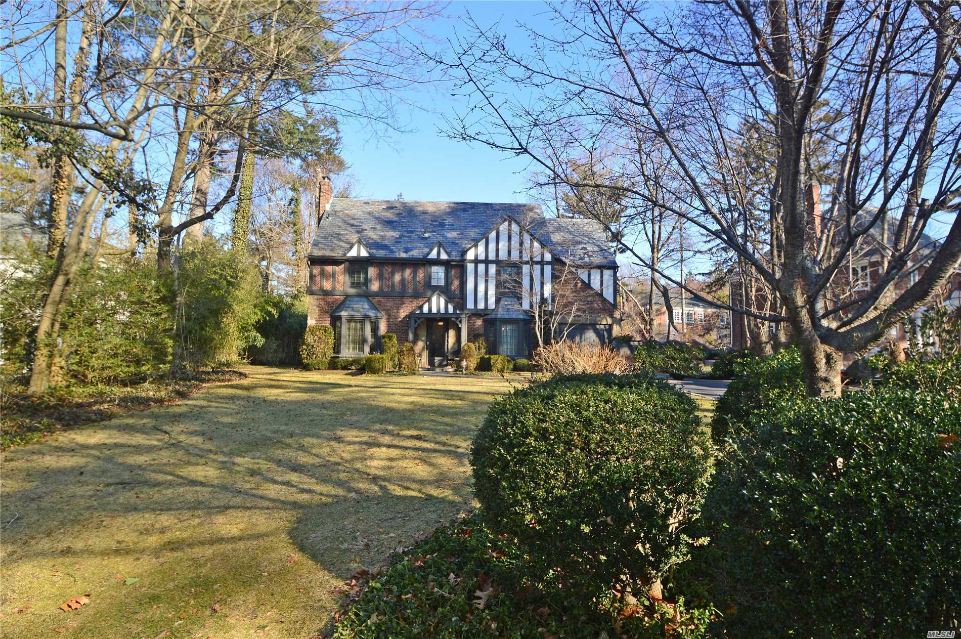 Magnificent Impeccable Tudor Featuring 4 Brs, 3 Full Baths ( 1 With Jacuzzi Tub). Enormous Kosher Eat In Kitchen With Granite Countertops, Ss Applncs And 2 Skylights. Grand Lr With Fp, Formal Dining Rm, Family Rm/Library Plus Separate Office. Full Finished Bsmt. Closets Galore Throughout House. Slate Roof . Conveniently Located. Not To Be Missed!