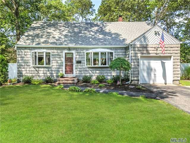 Exp Dormered Cape With Converted Garage To Family Room With Wood Burning Stove. This Home Boasts An Expansive Rear Yard With 20X40 Deck For Entertaining. All Vinyl Sided With Updated Roof, Eik, And Baths. This Home Is Ready To Move In And Affordable