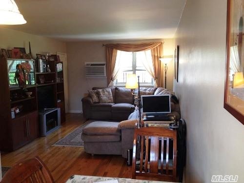 Beautiful Garden Corner Unit  Apartment Features Inverted Corner Unit With Seperate Entrance,  Modern Kit & Bathroom,  Hardwood Floors Plus Large Attic For Storage. School District #26. Convenient To Manhattan/Transportation & Shopping. Situated In A  Gorgeous Court Yard Setting.