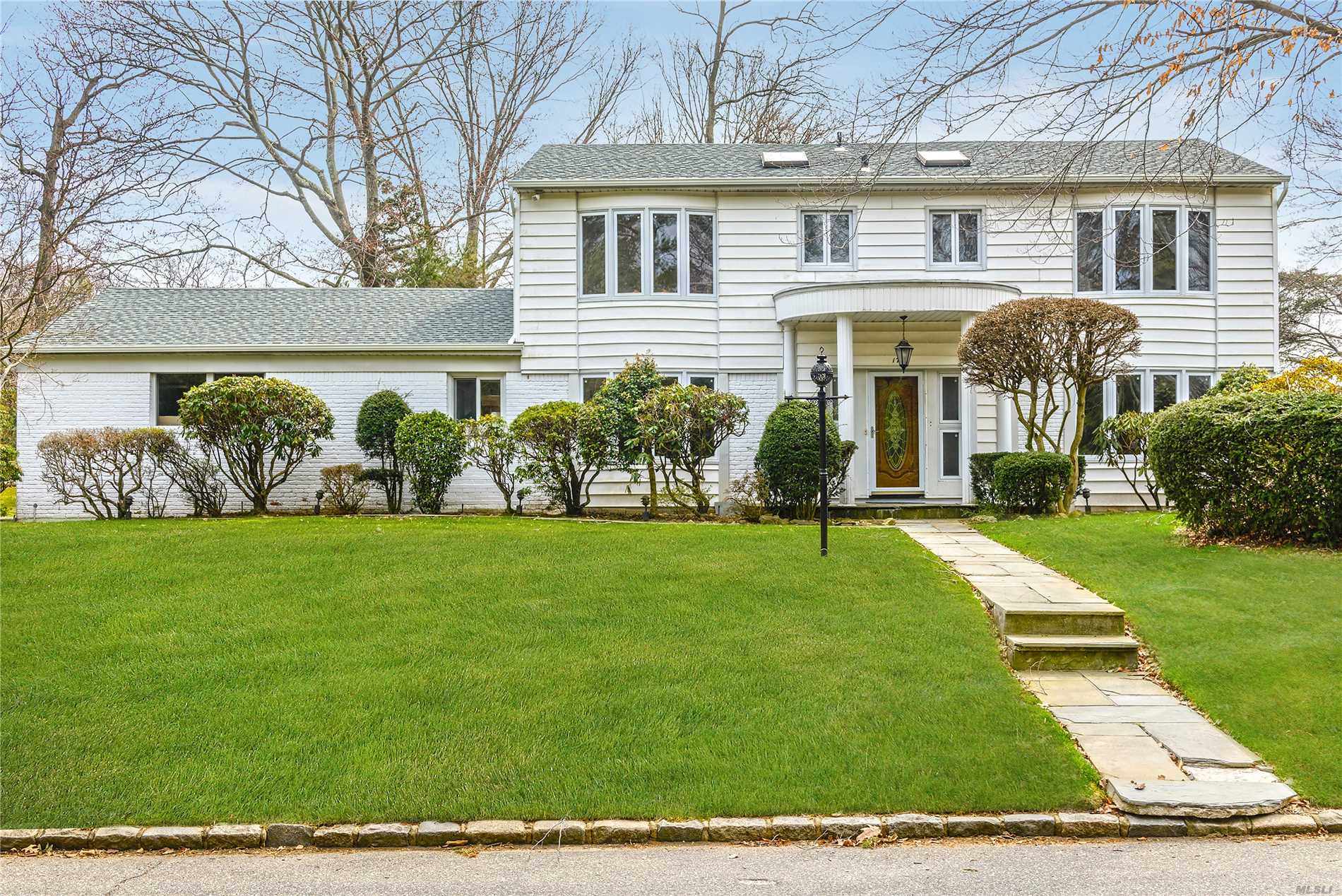 Welcome To This Wonderful Center Hall Colonial In The Heart Of Country Estates. This Fabulous Home Offers 5 Bedrooms, 3.5 Baths, Formal Living Room & Dining Room, Spacious Family Room With Fireplace, Hardwood Floors Throughout And Over-Sized Lush Property East Hills Park.