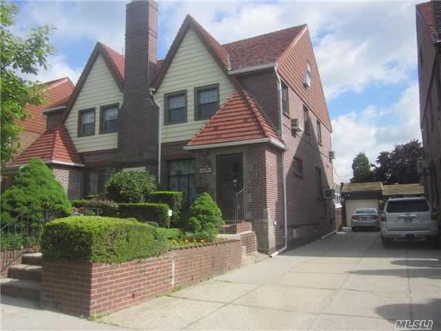 Semi Det Solid Brick Tudor, 4 Bedrooms, 11/2 Baths, Private Yard And 4 Car Driveway. Close To All Transportation, Shops And House Of Worship