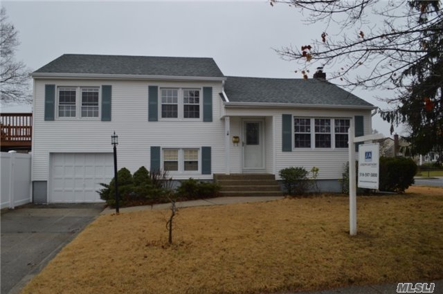 Newly Renovated Split In Bethpage Walking Distance To Central Boulevard Elementary School . New Kitchen With Granite Counter Tops 4 Floors Of Updates And Plenty Of Room To Raise A Family And Celebrate Those Special Occasions . New Gas Burner New Kitchen New Roof Too Many News To Mention .Converted Garage Full Finish Basement Enough Room For Mom. Tax Grievance Filed.