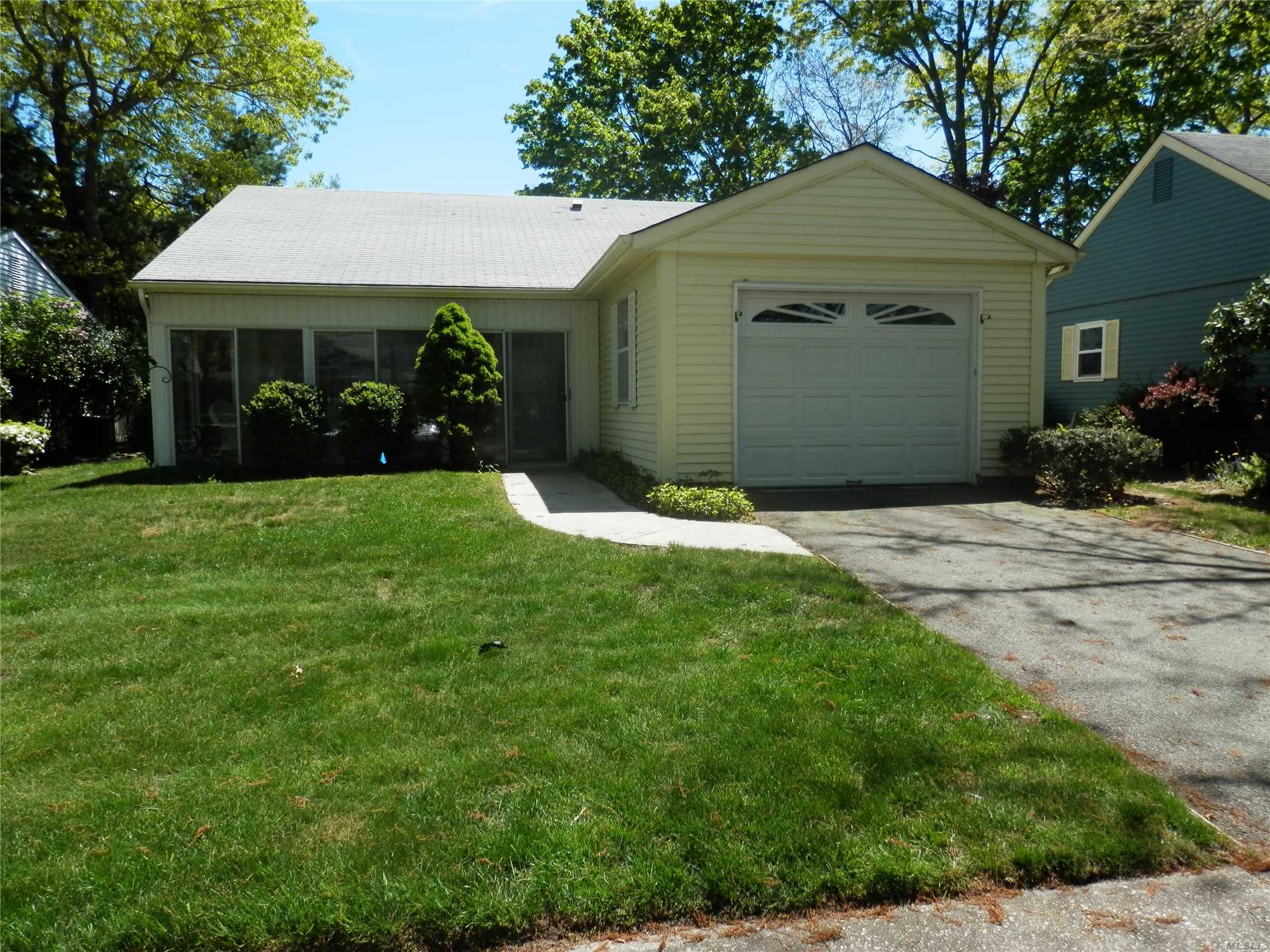 Lovely sunny home in beautiful Leisure Knoll. Closed in front porch and lovely patio to enjoy. Skylight in Kitchen. Enlarged garage with drop down stairs for attic storage. Gated security in evening. Bus service for residents. Many amenities to enjoy. Make this home your own.