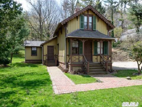 Charming Historic Carpenter Gothic Restored By The Roslyn Landmark Society With New Mechanical Systems Including Air Conditioning,  New Eat-In Granite Kitchen,  Two New Baths,  A New Roof And Surrounded By Spacious Property With A Sliver Of Waterview! Interior Can Be Changed,  Additions Are Possible.