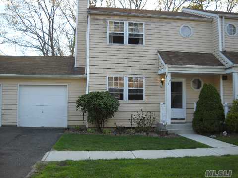 This Lovely End Unit Has Just Been Painted And New Floor Installed. Attached Garage. Great Community With Parks, Pool, Tennis, Basket Ball And More. 