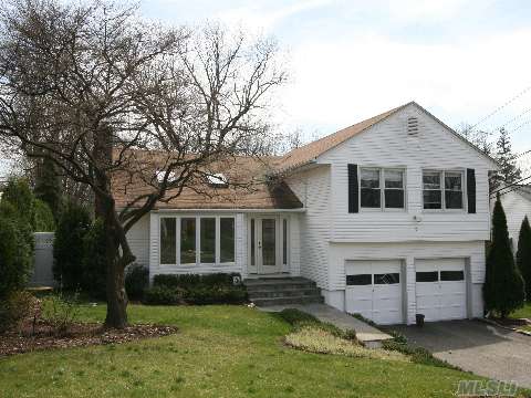 Mint Condition 3 Br, 2 Full Bath Split Level Home. 1st Flr. Has 14' Ceiling & Open Airy Flr. Plan. Gourmet Eik, Bright & Sunny Lr W/Oversized Bow Window. Dr Has Sliding Glass Doors To Fabulous Brick Patio W/Ingroun Gunite Pool. Ll Family Room With Additional Full Basement And Laundry.