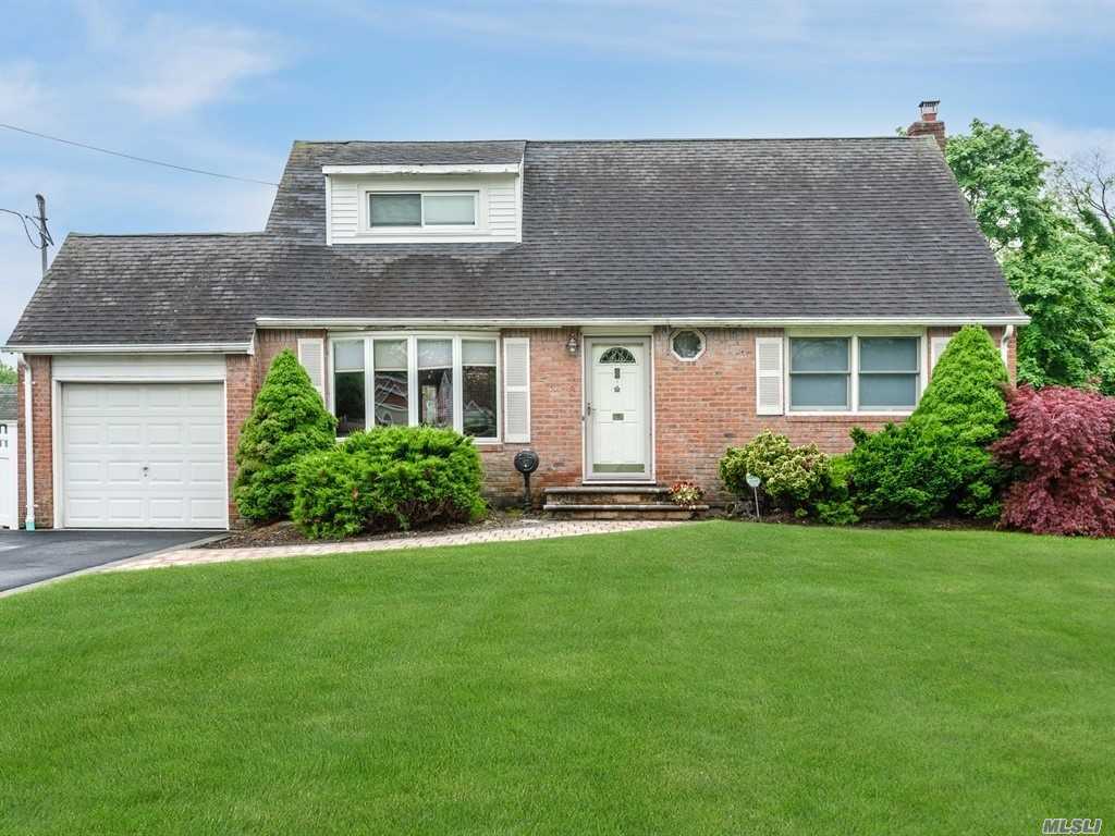 Beautiful Sherwood Gardens Cape Cod In Wonderful Condition. SUPER GREAT Home Just Waiting For Its New Owners! Enjoy The Huge Fenced Yard With Stunning Paver Patio!