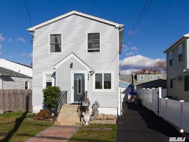 Updtd & Well Maintained Colonial In Village Of Lindenhurst. Priced Aggressively W/ Low Taxes.  Home Features & Recent Updates Inc: 2 Cac Units,  Upg Elec W/Generator Ready & Incl Generator W Sale,  Upd Heat System,  Security Camera System,  Pavers In Yd,  H/W Flrs,  Freshly Painted. Located Mid Blk.Great Curb Appeal & Lg 1.5 Det Garage.  Taxes W/Star Only $7, 780.18