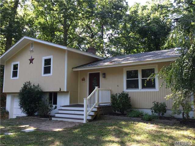 Turn Key Home On Quiet Half Acre In Coveted Paradise Shores. Only A Short Walk To The Beach, This Home Boasts 3 Bedrooms, Updated Kitchen, Windows, Baths, And Floors. Master Bedroom, Plus 2 More Bedrooms, Living Room With Wood Burning Stove, Dining Room. Above Ground Oil Tank And Attached Garage.