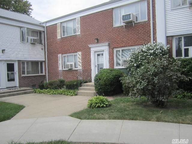 First Floor Corner 2 Bedroom Located In Picturesque And Tranquil Courtyard Setting. Convenience Galore! Walk To Bay Terrace Shopping Center & Top Rated School  Express Bus To City Right Outside Your Door! ; Lirr Minutes Away. Low~ Low~maintenance Includes All Utilities. Reserved Parking Available. Top Rated S.D #25~opportunity Knocks!