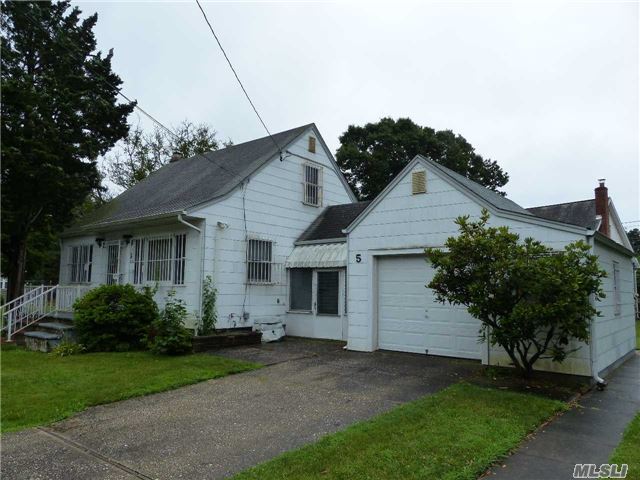 Rustic Cape Cod W/ An Oversized Yard! The Main Level Layout Includes An Eat In Kitchen, Living Room, 2 Bed Rooms, & Full Bath. A Full Walk Up Attic, W/ Heat, & A Staircase Make Up The 2nd Level. Other Highlights Are A Full Basement, Large Breezeway Connecting To An Oversized 1.5 Car Attached Garage! Minutes To Area Beaches, & Marinas! All Set On A 1/4 Acre +/- Fenced Lot!