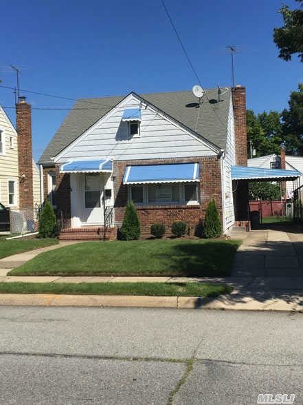 Welcome To A Bright And Spacious Cape Located Mid-Block With Great Curb Appeal. 3 Generous Sized Bedrooms, Eat-In Kitchen, A Nice Sized Lr, And 1 Full Bath. Hardwood Floors Throughout. 1/2 Finished Basement, Enclosed Porch Overlooking A Nice Fenced Yard. Convenient To All, Close To Train.