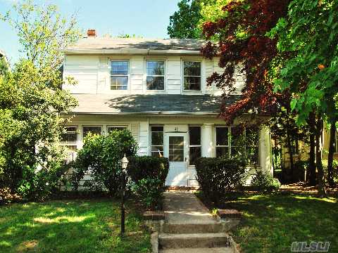 Charming 5 Bedroom 3  Bath Colonial 4 Blocks From The Lirr! This Traditional Home Has A Living Room With A Fireplace With A Small Den Adjacent, And A  Formal Dining Room.  The Eat-In-Kitchen Has A Butlers Pantry.  There Is A Guest Room And Bath Off The Kitchen.  There Are 3  Bedrooms On The Second Floor, One Having A Tandem Room.  The Attic Is A Large Finished Room. 