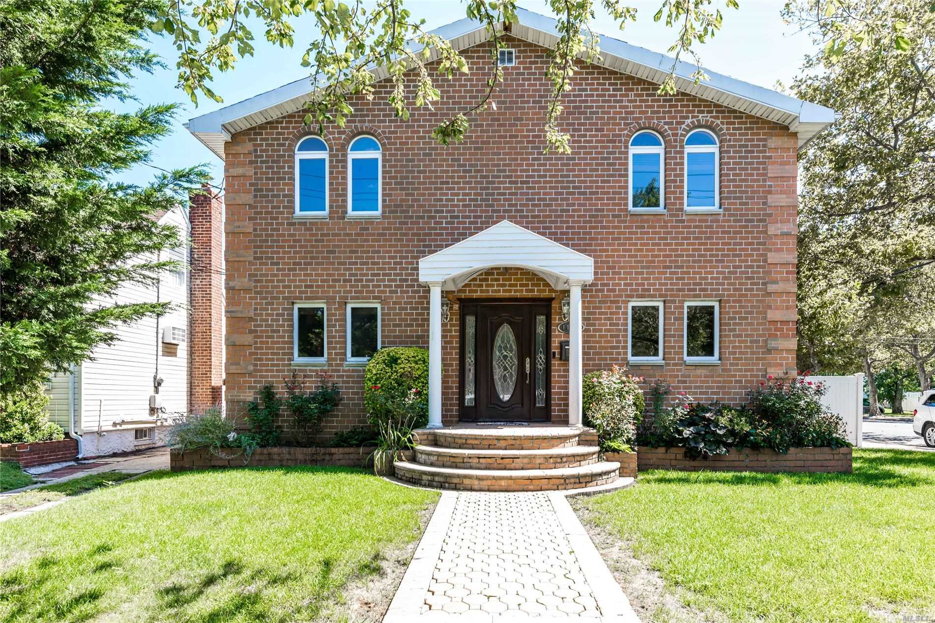 Rosedale Mini Mansion. 100% Brick. Remote Control Gate. Foyer, Great Room, Bar, Electric Fireplace. Living Rm, Formal Dining Rm, EIK, Bedroom and Full Bath on the 1st Floor. 2 Staircases (Spiral and regular) to 2nd Fl with 4 Bedrooms and 2 Full Baths. MBR has Full Bath with Steam Shower and Jacuzzi. Walk-in-Closet. Full Fin Basement with Bonus Rm, Living Rm, CAC. Sprinkler System. Many Extras.