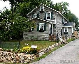 Updated 3/4 Br Country Colonial With Enclosed Porch Entrance, Country Eik, Beautifully Updated Vaulted Bath, Wood Floors Thruout,  Bonus Usable Attic And Basement With Sep Entrance, Full Bath, W/D, Summer Kitchen.  Huge Private Yard W/Shed And Long Private Drive.  Winter Water Views Too!  Dont Miss Out On The Tax Credit!