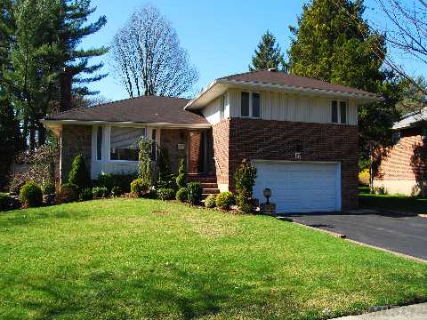 This Beautiful Redone Split Home In The Heart Of Woodbury Is The One You Have Been Waiting For!!! New Kit W/Granite Countertops And Custom Cabinets, New European Bath W/Custom Double Sink, Trex Deck W/Beautiful Landscaped Property. Room For Mom, Everything Redone To Perfection! Must See!Taxes Do Not Reflect Star Exemption Of $1100.06.