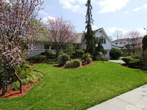 Pre-Inspected Sun-Drenched Expanded Chalet Ranch. This Handsome Home Has 4 Bedrooms, 3 Baths,  Expanded Granite Eik That Overlooks A Stunning Deck And Lush,Private Backyard On .23 Acre. It Is Highlighted By An Amazing Oversized Den/Family Rm & A Custom Master Suite. The Finished Basement Is A Great Play Area With Lots Of Storage $ A Laundry Center.  Perfectly Located.