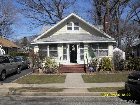 Legal 2 Family Located In The Plaza School District On The Rvc Border. This Home Features A 1st Floor 3 Room Apartment And A 6 Room 1st And 2nd Floor Apartment As Well As A Full Finished Basement And An Oversized Lot.  Minutes To Lirr.  Easy To Show!  Call Now For This Great Investment Opportunity! Seller Motivated!!