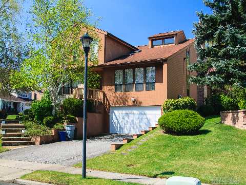 Open Floor Colonial/Contemp. In Excellent Condition. 3,200 Sq Ft Plus Finished Bsmt W/, Maid's Rm & F/Bth. Gym, Wet Bar, Storage, Laundry. Entry Hall, Lr, W/13' Ceiling, Den , Formal Dining Room, Eik With Granite Counters & Separate Breakfast Area. Hardwood Flrs. Perfect Location. Large Deck. W/Hot Tub. Renown Herricks Sd. East Exposure. Excel Commute To City.