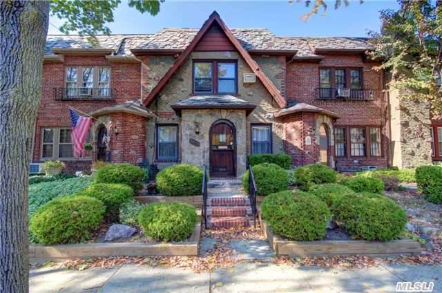 Very Deceiving From Outside! Beautifully Well Maintained Tudor On Great Block In Flushing North. Spacious Layout With Large Rooms, High Ceilings And Hardwood Floors Thruout, Finished Basement And Detached Garage. Q 16 On Corner To Flushing, Lirr To Nyc Only 4 Blocks Away.