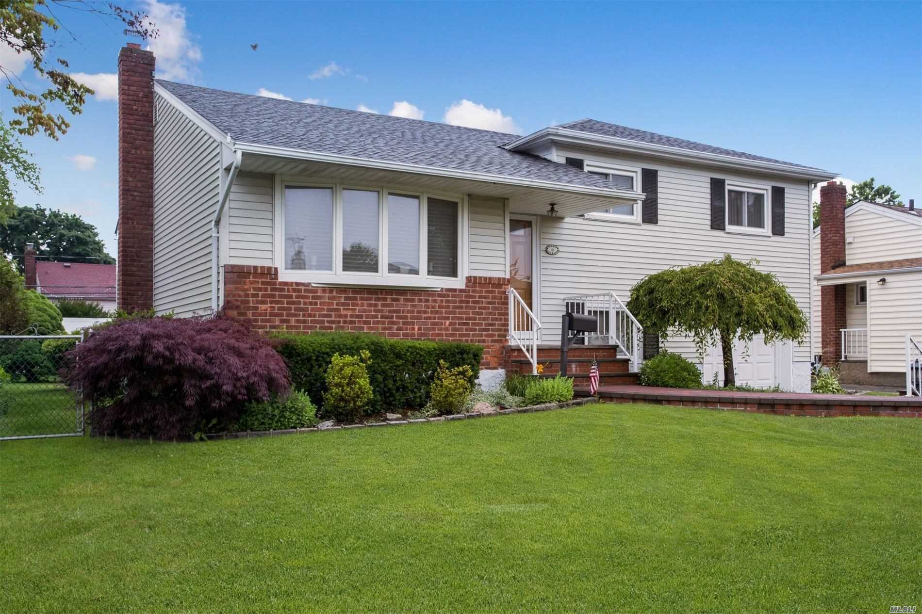 Welcome to 41 Cambridge Drive Hicksville, A beautiful mid block split level home with great curb appeal , professionally landscaped . Featuring 3/4 Bedrooms 1.5 bathrooms, hard wood floors, gas heat and gas cooking, updated roof, windows, siding, bathrooms and kitchen. Hurry, this one won&rsquo;t last.