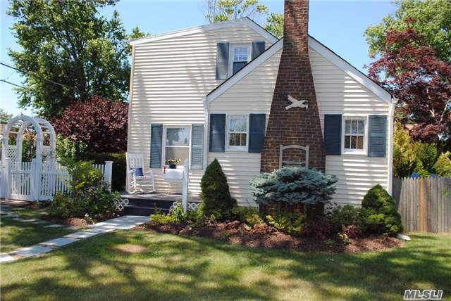 Don&rsquo;t Miss This Adorable Turn Key Cape Set South Of Montauk In West Islip. Features: All Wood Floors, Lr W/Wood Burning Fireplace, Formal Dining Room, Sunroom, Fully Updated Bath, Newly Sided Garage. Roof Less Than 2 Yrs. Enjoy Beach Assoc. And Docking Rights In This Sought After Community! X-Flood Zone, Flood Ins. Optional