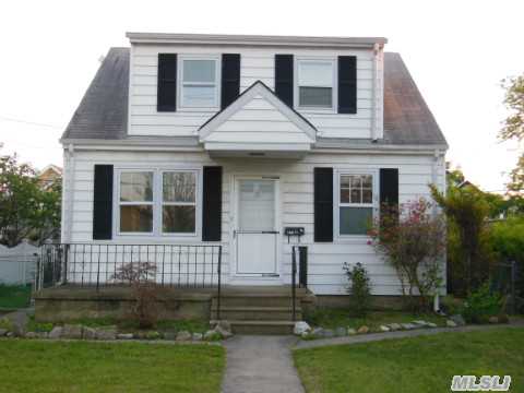 Barnum Island Cozy Cape Cod. This Doll House Has Oak Floors Throughout New Appliances And Private Yard. Needs Updating. Near Middle School,  Lirr,  And Town Of Hempstead Shell Creek Park. Low Taxes And Price Makes This Home A Must See!!!