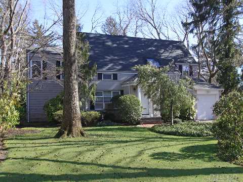 Beautiful, Sun-Drenched Expanded & Updated Colonial In The Heart Of Strathmore In East Hills.  Open Floor Plan Is Perfect For Entertaining. Lr/Fpl,Fmly Rm/Den, Sitting Area/Offc, Ceiling To Floor Windows, Lg Gourmet Eik W 3 Sets Of French Doors Leading To New Deck & Lush, Private Backyard Property. Master Suite + Tons Of Closets,+3 Additional Bedrms & Full Bath.