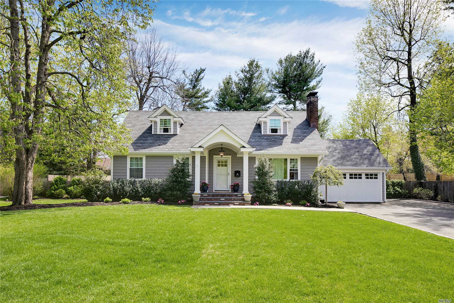 Picture perfect Lattingtown farm ranch in a mid-block location. Beautiful and newly renovated, turn key with new kitchen, living room with fireplace, and master bedroom on the first floor. Finished basement with gym, recreation room, full bath and laundry.