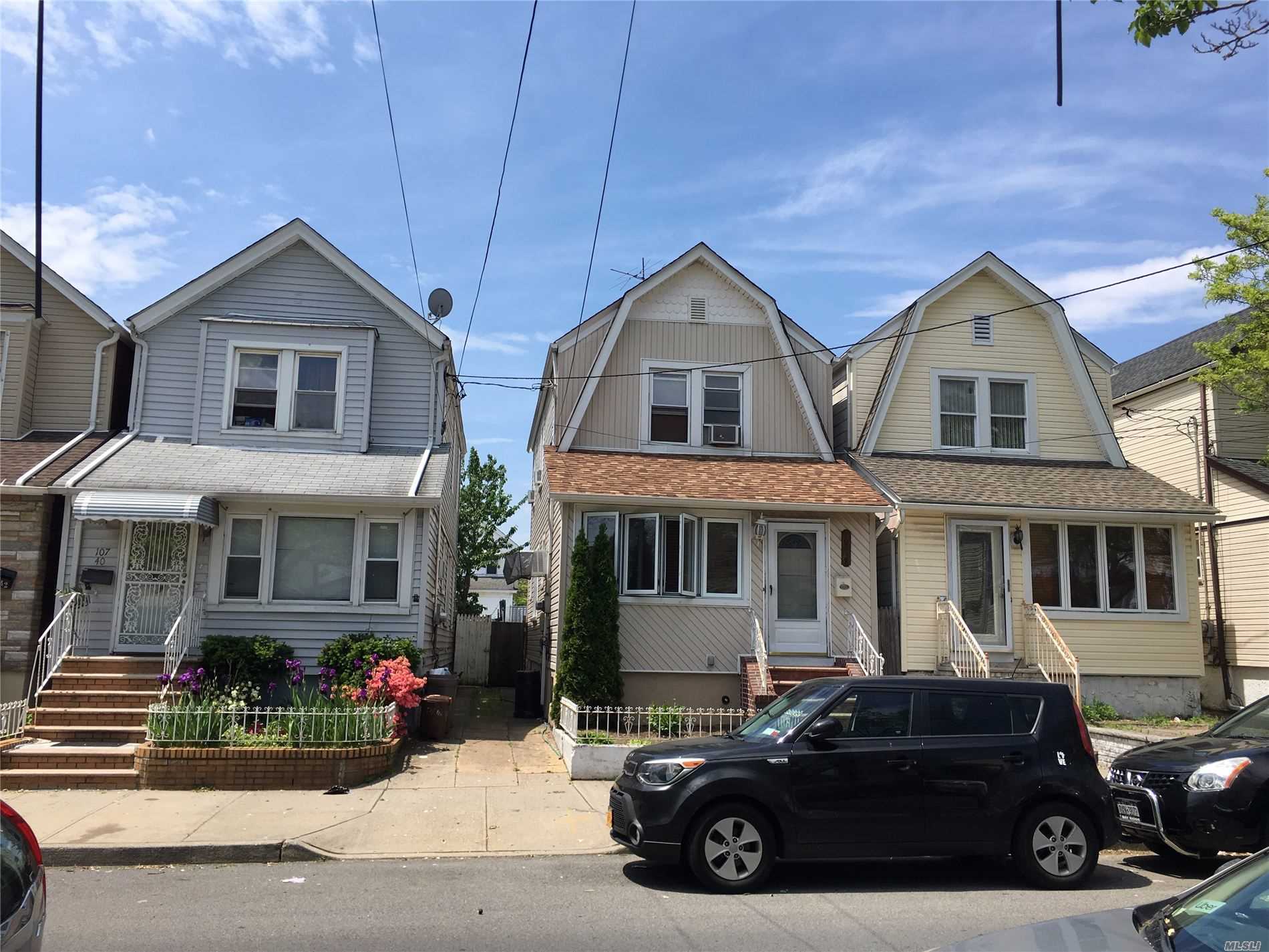 DETACHED SINGLE FAMILY IN OZONE PARK . FEATURE 3 BEDROOMS TWO FULL BATHS FORMAL DINING ROOM LARGE OPEN LIVING ROOM , EAT IN KITCHEN . Brand new Boiler .ONLY TWO BLOCK TO (A ) TRAIN, 88TH STREET STATION , MAJOR BUS LINES AND SHOPPING ETC..