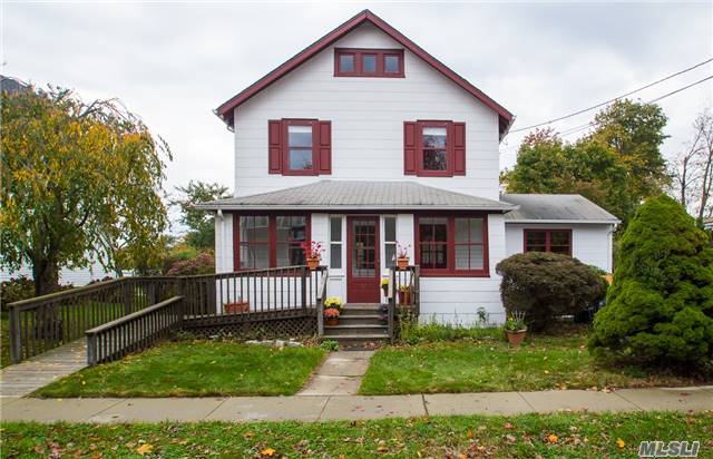 Well Maintained Colonial In Very Desirable Section Of Babylon Village 54 Oak St Boasts Enclosed Front Porch, Hardwood Floors, Door Mouldings, Cast Iron Radiators, House Equipped With Natural Gas, New Roof, Master On The 1st Floor, Large Bedrooms, Great Yard Space.