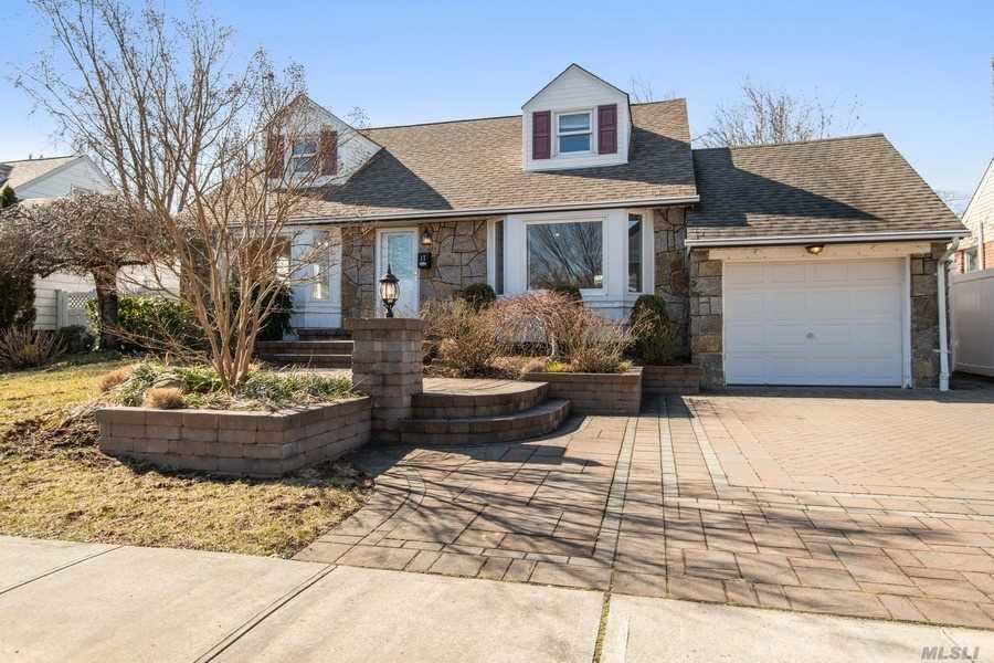 One of the Best Price House in Syosset school district! Great Location And Professional Landscaping! Four Bedrooms, 1.5 Bath Cape In Mid Block Location With Gas Heating And Cooking. Hardwood Floor and New Paint on Main Floor. 2008 Roof, Windows, Boiler, & Hw Heater. Finished Basement With Outside Entry. Must See!