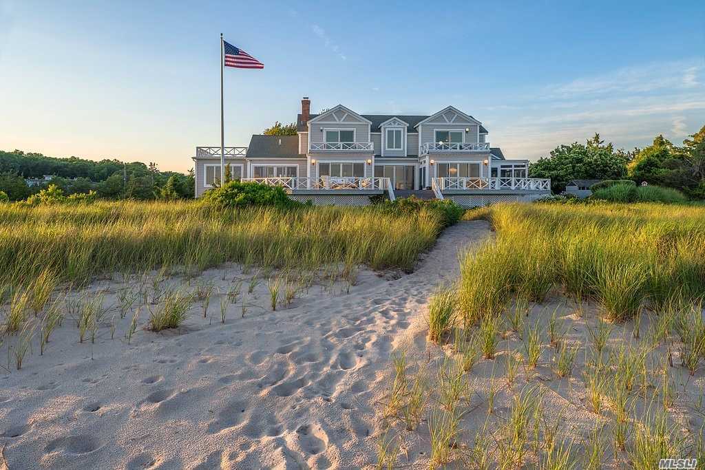 Quintessential North Fork Beach House. 240 Feet Of Gorgeous Sugar Sand Beach. Extraordinary Vantage Point Offers Over 180 Degree Views From New Suffolk To Mattituck And The South Fork. Understated Elegance And The Layout Is An Entertainer&rsquo;s Dream With Kitchen, Eating Area And Living Room With Fireplace, All Open To Each Other And All Facing Peconic Bay. Wednesday Evening Sailing Races Around Robins Island Has A Front Row Seat!